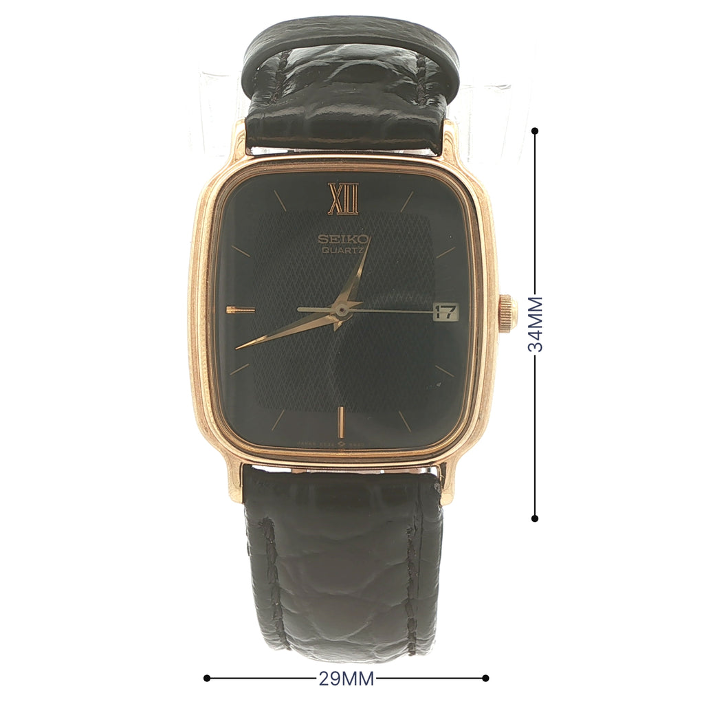 1986 Estate Seiko Quartz Gold Tone Rectangular Watch Black Dial Date 29mm x 34mm