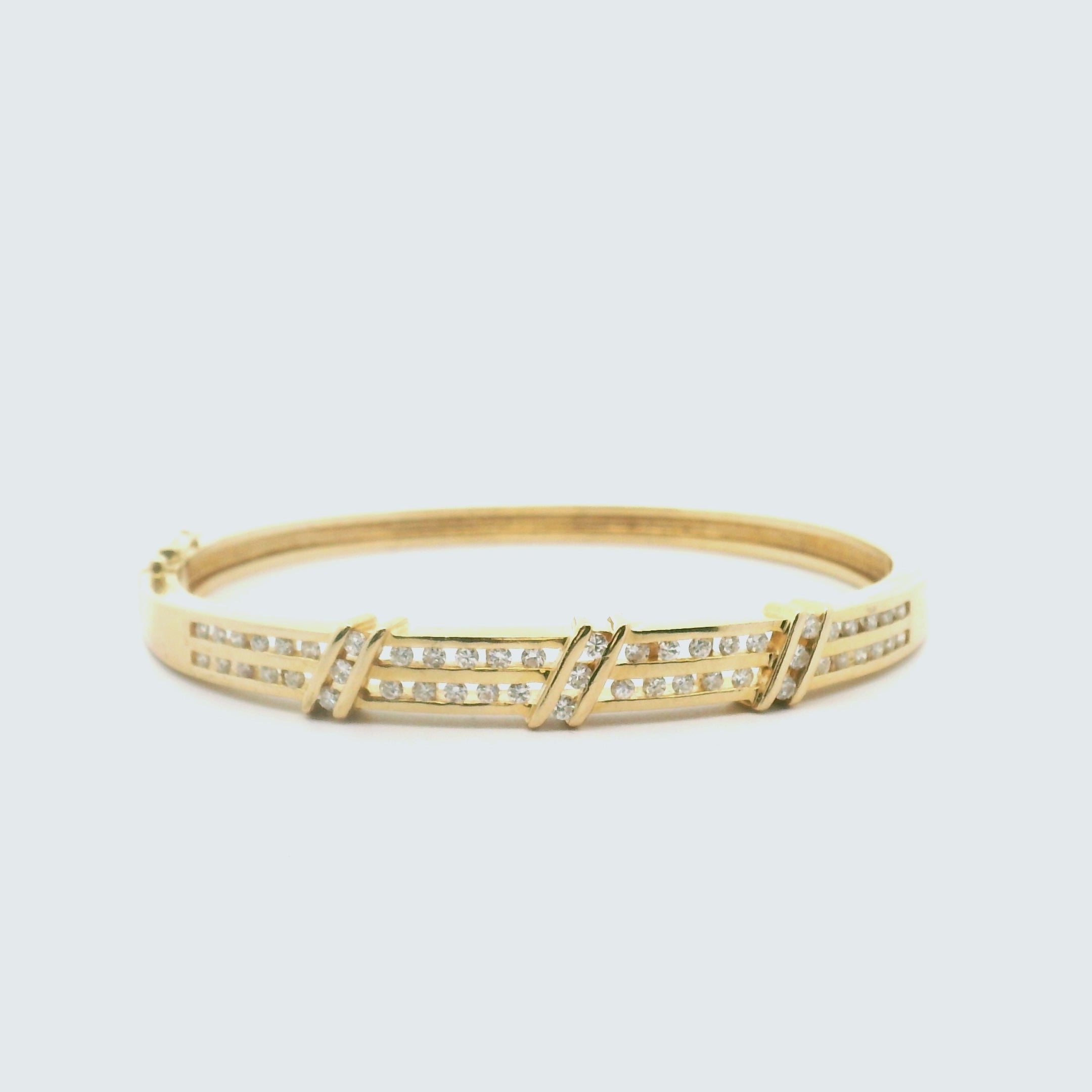 Unique 14K Gold Diamond Channel Bracelet