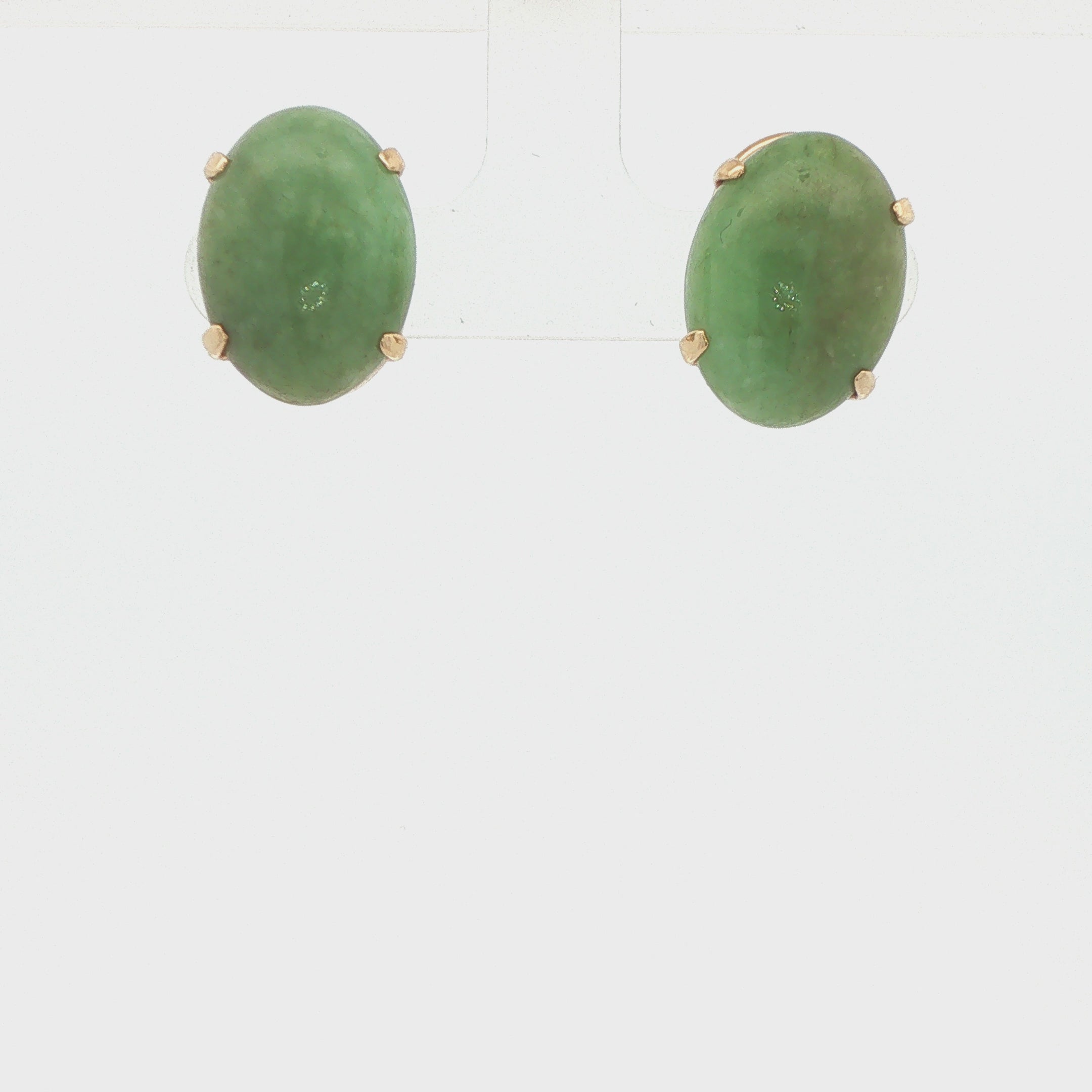 Circa 1950s–1960s Vintage Estate Natural Jade 14K Yellow Gold Clip-On Earrings with Oval Cabochons
