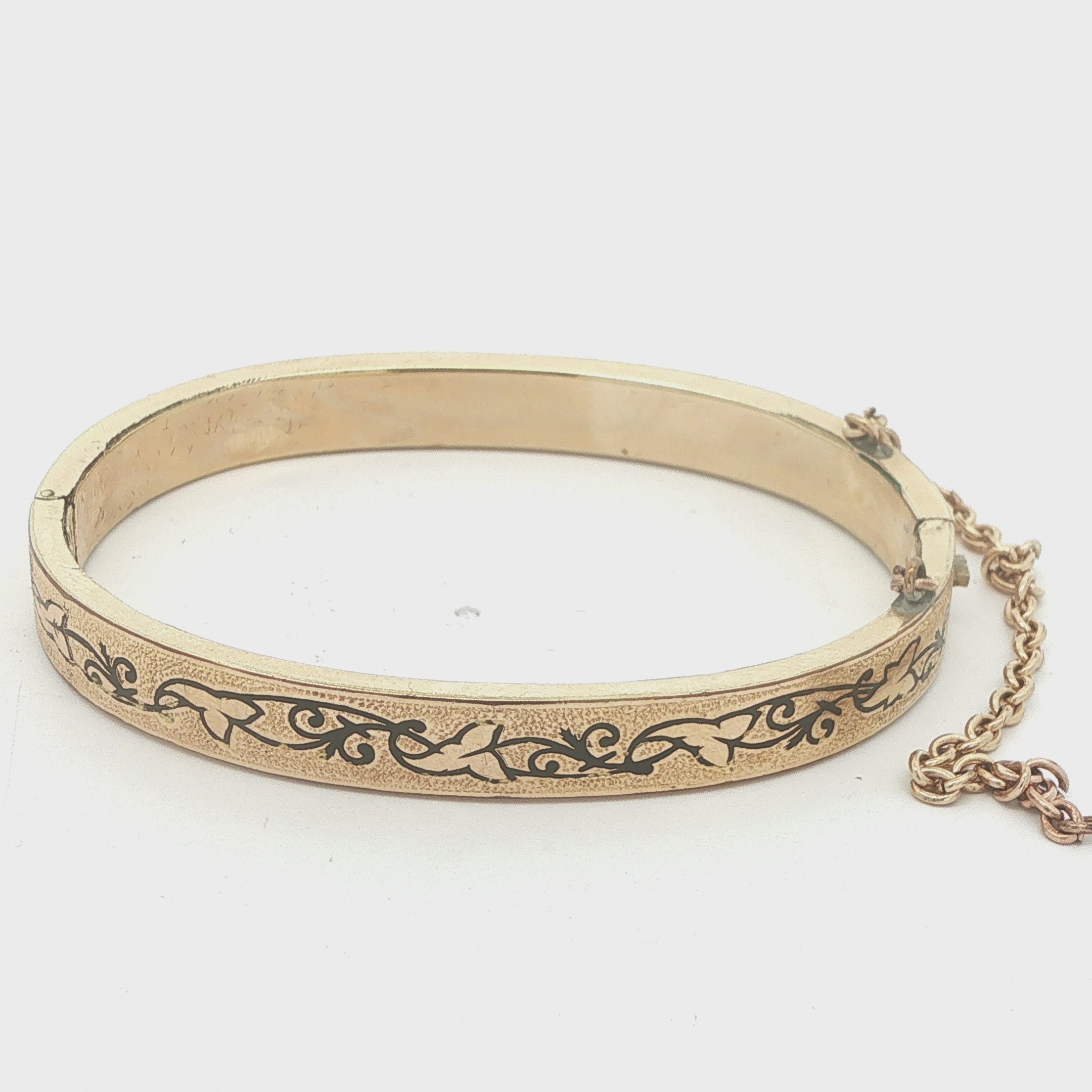 Circa 1950s–1960s Estate Gold Filled Black Enamel Hinged Bangle Bracelet with Safety Chain 56mm