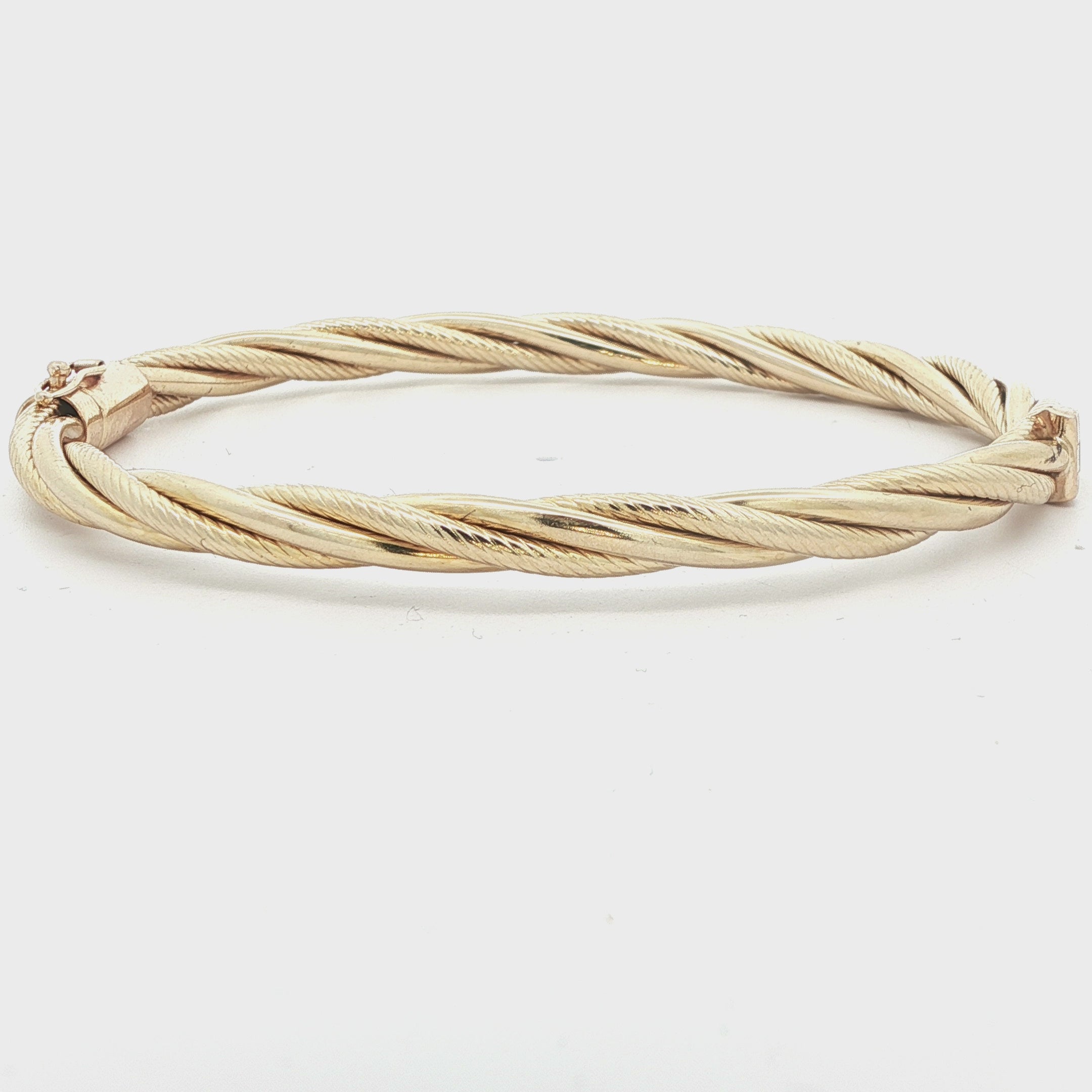 14k Yellow Gold 1995 Twisted Bangle