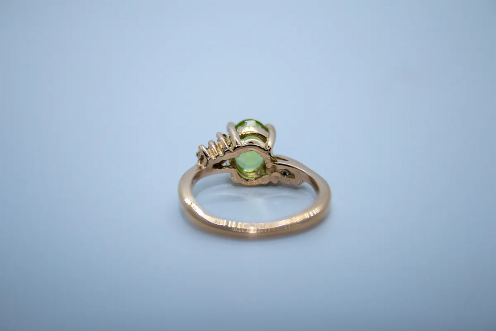 14 K Y/G Peridot and Diamond Ring
